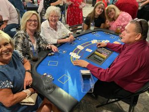 Women sitting at blackjack table